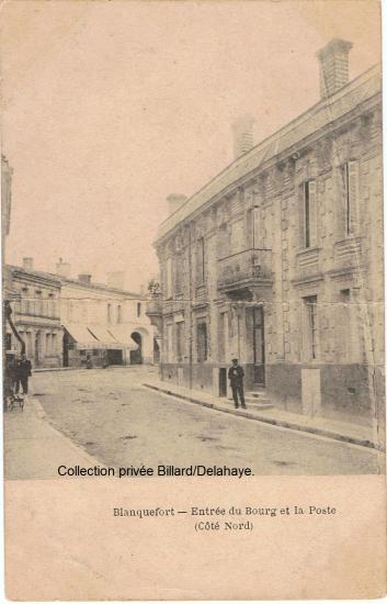 Haut de la rue Gambetta, la poste à l'angle de la place de l'Eglise.