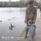 L'ENFANT ET LES PIGEONS AU PARC DE MAJOLAN. (Mistral gagnant)